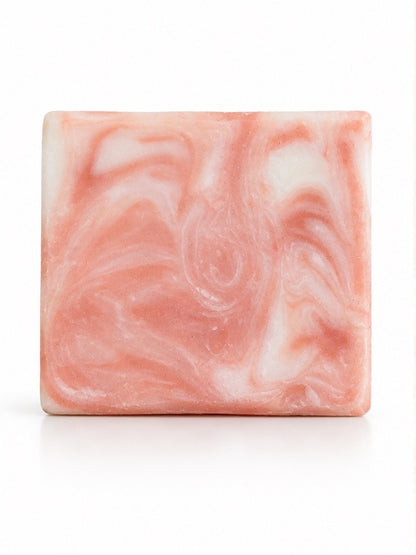 Grapefruit Grove tallow soap bar with kaolin clay and grapefruit, unwrapped on a white background