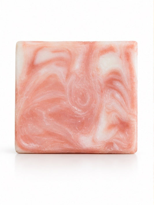 Grapefruit Grove tallow soap bar with kaolin clay and grapefruit, unwrapped on a white background