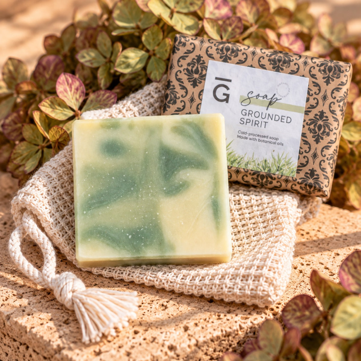 Grounded Spirit soap - unwrapped bar and wrapped package with jute bag